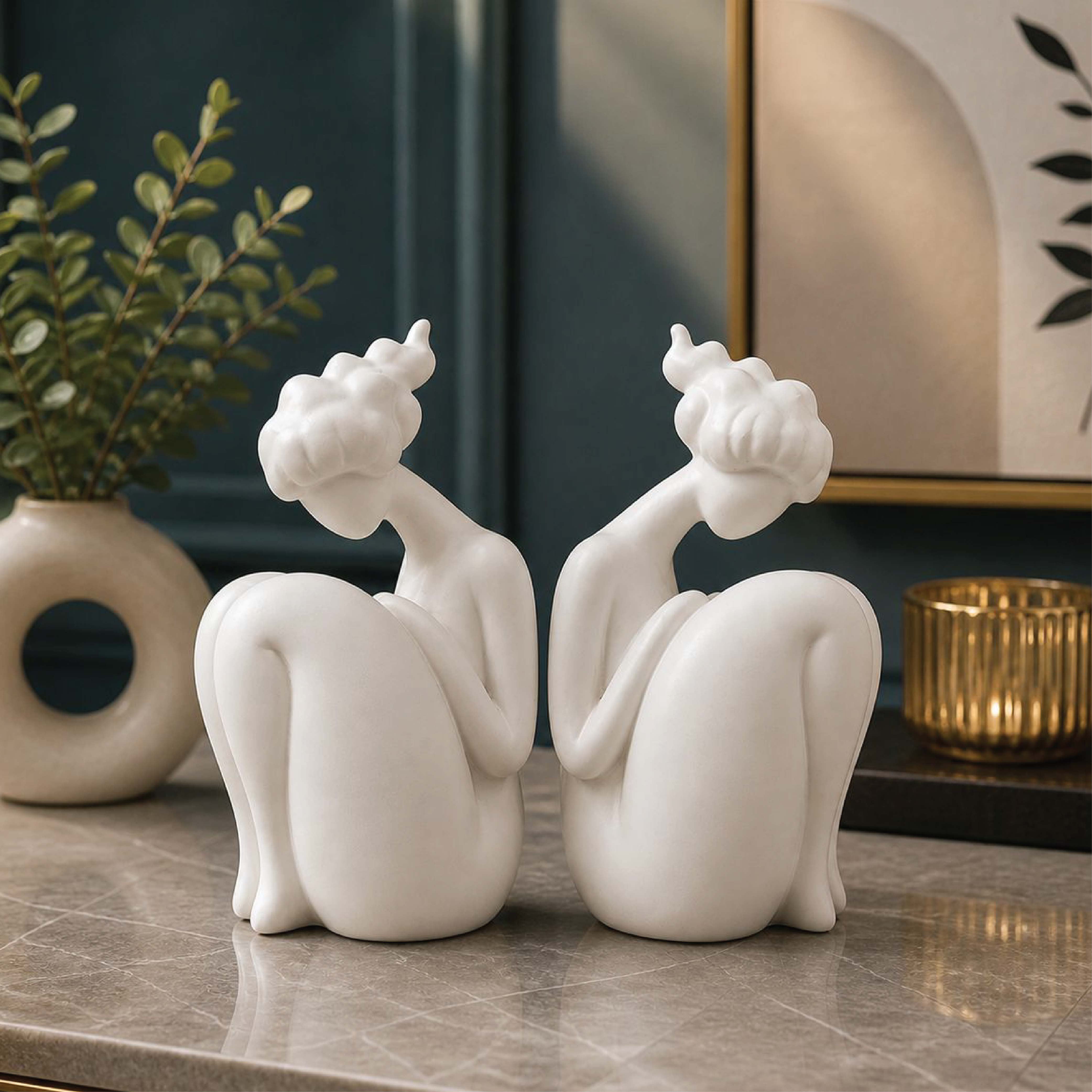White Ceramic Sitting Female Figurine