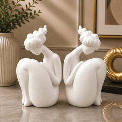 White Ceramic Sitting Female Figurine
